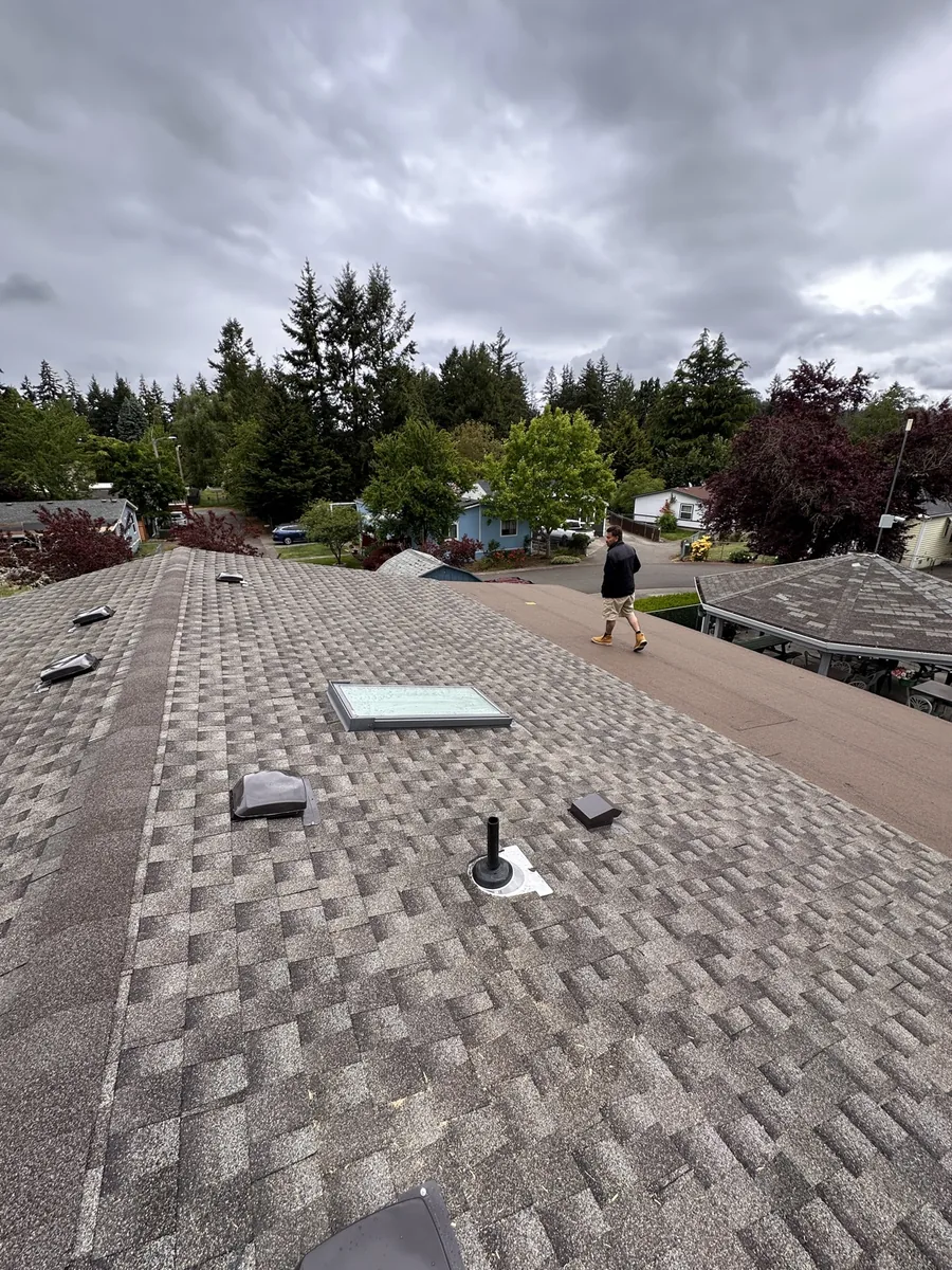 Finished GAF architectural shingle roof with skylight and roof vents, SE Foster Rd, Portland OR
