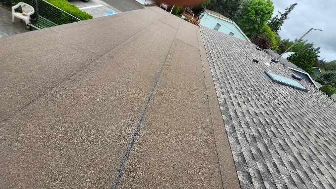 Low-slope roof section transitioning to shingles, Portland OR